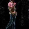 Rema in a studio water portrait.