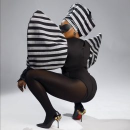 Yemi Alade in black-and-white striped fashion look promoting It’s Yemi Alade