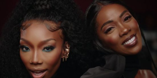 Brandy and Tiwa Savage in the Somebody's Son video
