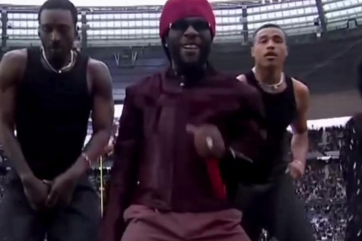 Burna Boy performs at the NFL Paris Game halftime show at Stade de France