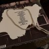Back cover of Skepta's The Fork and Knife vinyl with the tracklist inside a map of Nigeria