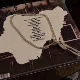 Back cover of Skepta's The Fork and Knife vinyl with the tracklist inside a map of Nigeria