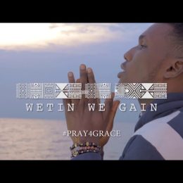Victor AD praying in the official Wetin We Gain music video